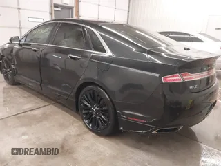 2015 Lincoln MKZ z VIN 3LN6L2J95FR620390, wystawiony jako IAAI lot #41586267 z przebiegiem 127 870 mil mil oraz . Historia ofert i sprzedaży dostępna na DreamBid. Obrazek 3.