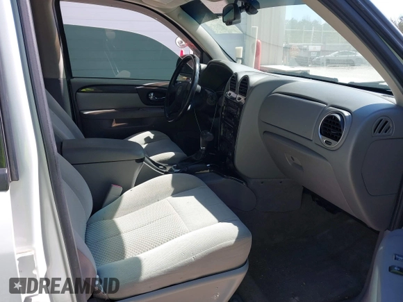 2007 GMC Envoy SLE with VIN 1GKDT13S472223365, listed as a IAAI auction lot 41690531 with 170,539 mi miles. Bid and sale history available at carsss.com. Image 5.