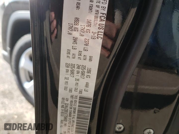 2019 Jeep Compass Latitude with VIN 3C4NJCBB1KT750032, listed as a Copart auction lot 82931994 with 59,293 mi miles and Salvage Title. Bid and sale history available at DreamBid. Image 14.