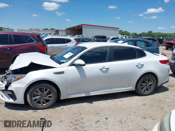 2019 Kia Optima LX z VIN 5XXGT4L38KG372576, wystawiony jako IAAI lot #42248090 z przebiegiem 98 368 mil mil oraz . Historia ofert i sprzedaży dostępna na DreamBid. Obrazek 14.