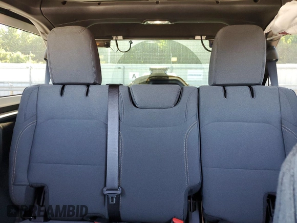 2024 Jeep Wrangler Sport S with VIN 1C4PJXDG2RW346671, listed as a Copart auction lot 57966375 with 9,430 mi miles and Salvage title. Bid and sale history available at DreamBid. Image 10.