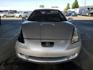 2001 Toyota Celica GT z VIN JTDDR32TX10093188, wystawiony jako Copart lot #56589435 z przebiegiem 134 624 mil mil oraz Szkoda całkowita • Salvage title. Historia ofert i sprzedaży dostępna na DreamBid. Obrazek 5.