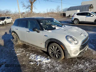 2017 MINI Clubman Cooper S with VIN WMWLU5C38H2E84018, listed as a Copart auction lot 83228824 with 151,963 mi miles and Salvage Title. Bid and sale history available at carsss.com. Image 4.