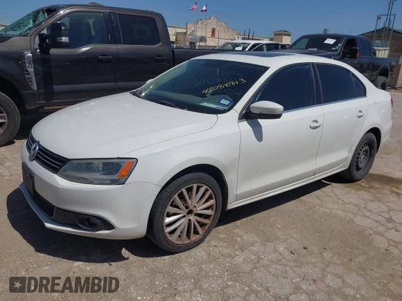 2011 Volkswagen Jetta SEL z VIN 3VWLX7AJ2BM006596, wystawiony jako IAAI lot #42088813 z przebiegiem 192 884 mil mil oraz . Historia ofert i sprzedaży dostępna na DreamBid. Obrazek 2.