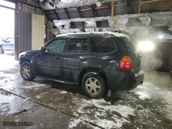 2005 GMC Envoy Denali with VIN 1GKET63M152386829, listed as a Copart auction lot 41901885 with 51,088 mi miles and Salvage Title. Bid and sale history available at carsss.com. Image 2.