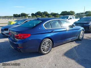 2019 BMW 5 Series 530e iPerformance with VIN WBAJA9C50KB393760, listed as a IAAI auction lot 41426819 with 36,944 mi miles. Bid and sale history available at carsss.com. Image 4.