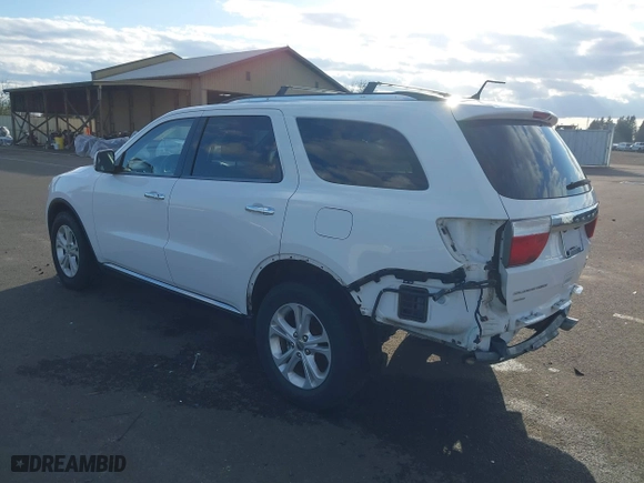 2013 Dodge Durango Crew with VIN 1C4RDJDGXDC675853, listed as a IAAI auction lot 41742767 with 101,555 mi miles. Bid and sale history available at carsss.com. Image 3.