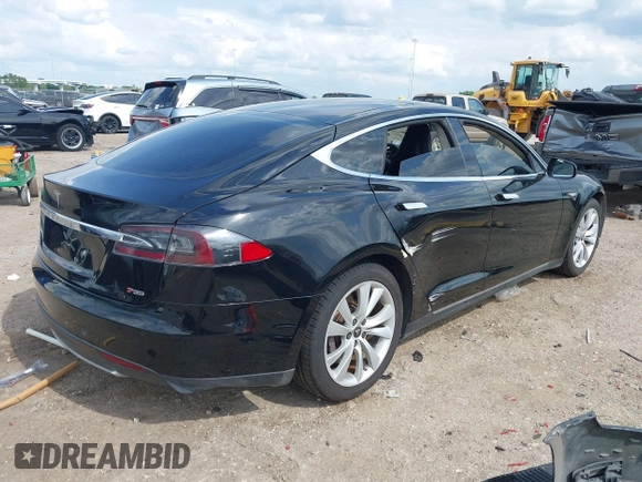 2014 Tesla Model S 60 z VIN 5YJSA1H1XEFP44397, wystawiony jako IAAI lot #42140917 z przebiegiem 136 515 mil mil oraz . Historia ofert i sprzedaży dostępna na DreamBid. Obrazek 4.