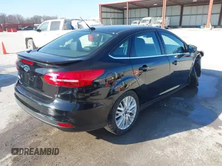 2017 Ford Focus Titanium с VIN 1FADP3J2XHL328847, выставлен на аукционе IAAI как лот 41740627 с пробегом 89 276 миль миль и . История ставок и продаж доступна на DreamBid. Изображение 4.