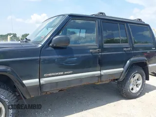 2000 Jeep Cherokee z VIN 1J4FF48S7YL273642, wystawiony jako IAAI lot #42743391 z przebiegiem 200 780 mil mil oraz . Historia ofert i sprzedaży dostępna na DreamBid. Obrazek 12.