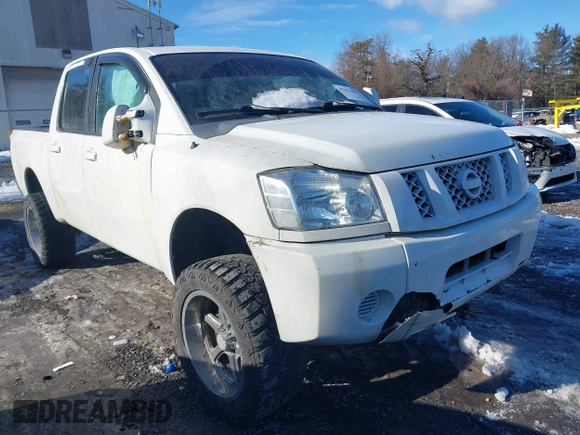 2012 Nissan Titan SV with VIN 1N6BA0EJ0CN309933, listed as a IAAI auction lot 41472091 with 147,635 mi miles. Bid and sale history available at carsss.com. Image 1.
