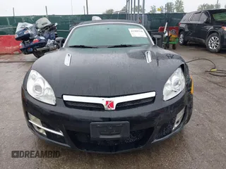 2009 Saturn Sky z VIN 1G8MN35B59Y104152, wystawiony jako IAAI lot #42308236 z przebiegiem 190 823 mil mil oraz . Historia ofert i sprzedaży dostępna na DreamBid. Obrazek 12.