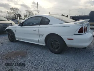 1997 Ford Mustang with VIN 1FALP4044VF174876, listed as a Copart auction lot 41601355 with 103,828 mi miles and Salvage Title. Bid and sale history available at carsss.com. Image 2.