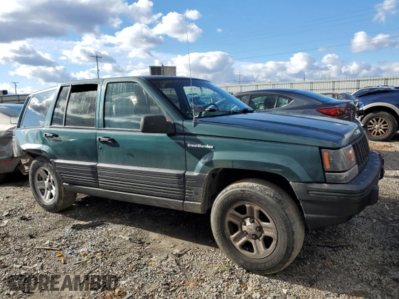1993 Jeep Grand Cherokee Laredo with VIN 1J4GZ58S4PC580315, listed as a Copart auction lot 85105304 with 202,460 mi miles and Clean Title. Bid and sale history available at carsss.com. Image 4.