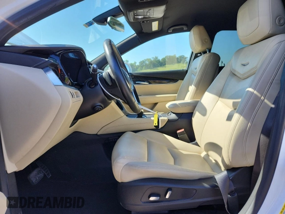 2017 Cadillac XT5 FWD z VIN 1GYKNARS2HZ173122, wystawiony jako Copart lot #63027715 z przebiegiem 130 467 mil mil oraz Czysty tytuł • Clean title. Historia ofert i sprzedaży dostępna na DreamBid. Obrazek 7.