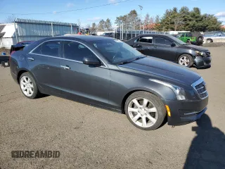 2015 Cadillac ATS Standard AWD with VIN 1G6AG5RX8F0135123, listed as a Copart auction lot 87646585 with 130,446 mi miles and Salvage title. Bid and sale history available at DreamBid. Image 4.