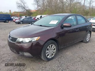 2011 Kia Forte EX with VIN KNAFU4A2XB5444513, listed as a IAAI auction lot 42002807 with 233,408 mi miles. Bid and sale history available at carsss.com. Image 2.