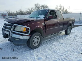 2000 Ford F-150 XL with VIN 1FTRX18L2YNA50128, listed as a IAAI auction lot 40956879 with 1 mi miles. Bid and sale history available at carsss.com. Image 16.