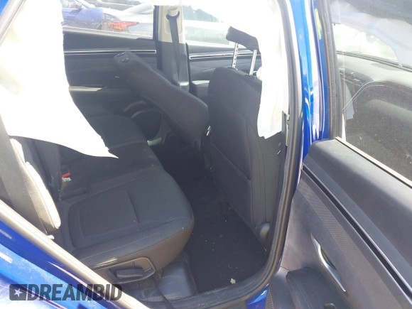 2022 Hyundai Tucson SEL with VIN 5NMJB3AE3NH059349, listed as a IAAI auction lot 42330576 with 27,010 mi miles and . Bid and sale history available at DreamBid. Image 8.