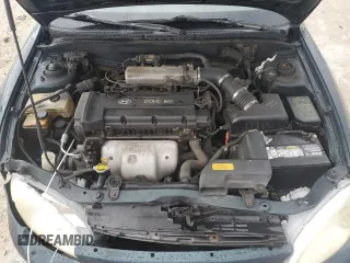 2000 Hyundai Elantra GLS z VIN KMHJF35F3YU002102, wystawiony jako Copart lot #73243004 z przebiegiem 79 155 mil mil oraz Szkoda całkowita • Salvage title. Historia ofert i sprzedaży dostępna na DreamBid. Obrazek 13.
