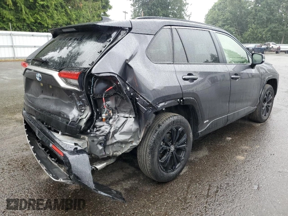 2023 Toyota RAV4 Hybrid XSE with VIN JTME6RFV5PJ037206, listed as a Copart auction lot 61597265 with 5,094 mi miles and Salvage title. Bid and sale history available at DreamBid. Image 3.