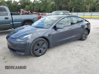 2023 Tesla Model 3 z VIN 5YJ3E1EA4PF407112, wystawiony jako Copart lot #58464575 z przebiegiem 75 629 mil mil oraz Nie do naprawy • Non repairable. Historia ofert i sprzedaży dostępna na DreamBid. Obrazek 1.