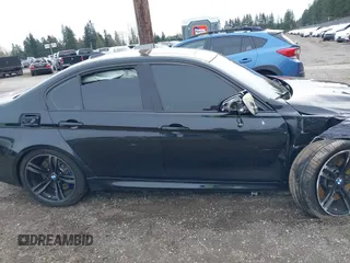 2015 BMW M3 with VIN WBS3C9C55FP803198, listed as a IAAI auction lot 41778014 with 45,367 mi miles and . Bid and sale history available at DreamBid. Image 13.