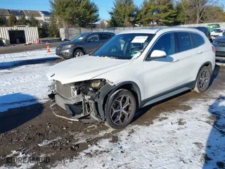 2018 BMW X1 xDrive28i with VIN WBXHT3C36J5L30217, listed as a IAAI auction lot 41237775 with 60,071 mi miles. Bid and sale history available at carsss.com. Image 20.