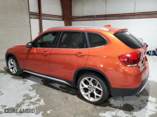 2013 BMW X1 xDrive28i with VIN WBAVL1C5XDVR84063, listed as a Copart auction lot 52396725 with 145,239 mi miles and Clean Title. Bid and sale history available at carsss.com. Image 2.