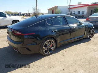2021 Kia Stinger GT2 with VIN KNAE55LC3M6089699, listed as a IAAI auction lot 41035872 with 81,192 mi miles. Bid and sale history available at carsss.com. Image 4.