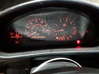 1995 BMW 3 Series 318i z VIN WBABK5322SEC85089, wystawiony jako Copart lot #58808065 z przebiegiem 79 477 mil mil oraz Szkoda całkowita • Salvage title. Historia ofert i sprzedaży dostępna na DreamBid. Obrazek 9.