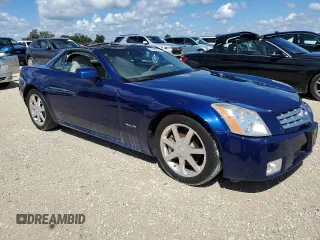 2004 Cadillac XLR z VIN 1G6YV34A045601459, wystawiony jako Copart lot #74522994 z przebiegiem Nie podano mil oraz Szkody całkowita. Historia ofert i sprzedaży dostępna na DreamBid. Obrazek 4.