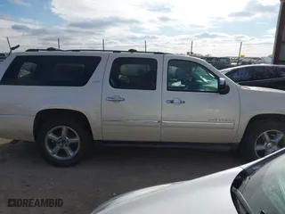 2012 Chevrolet Suburban LTZ with VIN 1GNSKKE71CR251475, listed as a IAAI auction lot 41276204 with 241,316 mi miles. Bid and sale history available at carsss.com. Image 13.