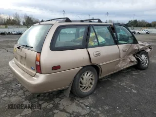 1997 Ford Escort LX with VIN 3FALP15P7VR132710, listed as a Copart auction lot 87546515 with 185,646 mi miles and Salvage Title. Bid and sale history available at carsss.com. Image 3.