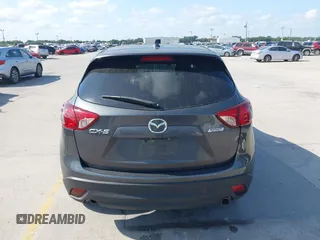 2015 Mazda CX-5 Touring with VIN JM3KE2CY9F0468199, listed as a IAAI auction lot 42099253 with 110,909 mi miles and . Bid and sale history available at carsss.com. Image 16.