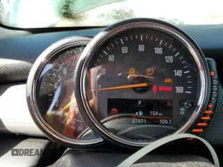 2014 MINI Hardtop with VIN WMWXM5C56ET935422, listed as a Copart auction lot 86022454 with 87,471 mi miles and Salvage Title. Bid and sale history available at DreamBid. Image 9.