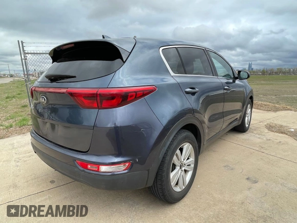 2017 Kia Sportage LX with VIN KNDPM3AC6H7208125, listed as a Copart auction lot 51288795 with 128,641 mi miles and Clean Title. Bid and sale history available at DreamBid. Image 4.