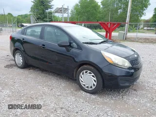 2013 Kia Rio LX with VIN KNADM4A35D6270556, listed as a IAAI auction lot 42115208 with 165,249 mi miles. Bid and sale history available at carsss.com. Image 1.