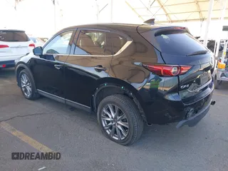 2020 Mazda CX-5 Grand Touring z VIN JM3KFADMXL0740144, wystawiony jako IAAI lot #41830203 z przebiegiem 70 535 mil mil oraz . Historia ofert i sprzedaży dostępna na DreamBid. Obrazek 3.