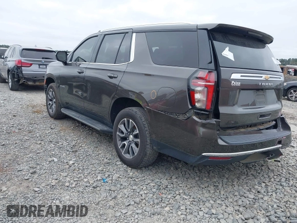 2021 Chevrolet Tahoe LT with VIN 1GNSCNKD7MR439900, listed as a IAAI auction lot 41187590 with 119,131 mi miles and . Bid and sale history available at DreamBid. Image 3.