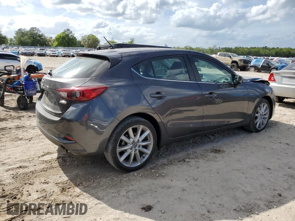 2017 Mazda 3 Touring with VIN 3MZBN1L77HM117864, listed as a Copart auction lot 51895385 with 63,076 mi miles and Salvage Title. Bid and sale history available at carsss.com. Image 3.