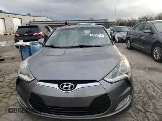 2014 Hyundai Veloster RE:FLEX z VIN KMHTC6AD2EU216453, wystawiony jako Copart lot #87090324 z przebiegiem 147 771 mil mil oraz Czysty tytuł • Clean title. Historia ofert i sprzedaży dostępna na DreamBid. Obrazek 5.