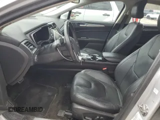 2016 Ford Fusion Titanium with VIN 3FA6P0K99GR319253, listed as a Copart auction lot 51935965 with 186,717 mi miles and Salvage Title. Bid and sale history available at DreamBid. Image 7.
