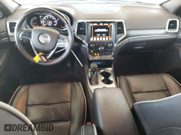 2018 Jeep Grand Cherokee Overland z VIN 1C4RJFCG4JC425589, wystawiony jako Copart lot #61775775 z przebiegiem 102 040 mil mil oraz Szkoda całkowita • Salvage title. Historia ofert i sprzedaży dostępna na DreamBid. Obrazek 8.