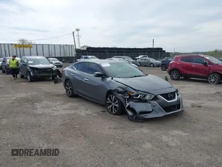 2018 Nissan Maxima SV with VIN 1N4AA6AP4JC377985, listed as a IAAI auction lot 42071678 with 104,326 mi miles and . Bid and sale history available at DreamBid. Image 1.