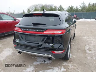 2017 Lincoln MKC Premiere with VIN 5LMCJ1D91HUL33023, listed as a IAAI auction lot 40976537 with 112,695 mi miles. Bid and sale history available at carsss.com. Image 4.