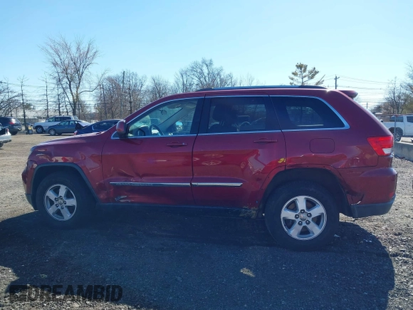 2012 Jeep Grand Cherokee Laredo with VIN 1C4RJFAG7CC297757, listed as a IAAI auction lot 41901645 with 270,731 mi miles. Bid and sale history available at carsss.com. Image 14.