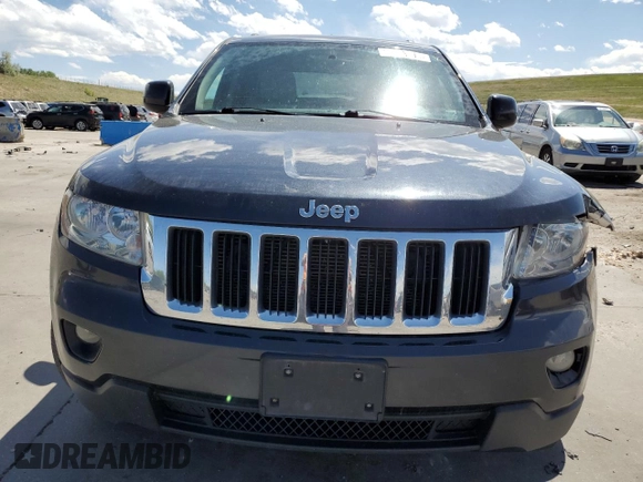 2013 Jeep Grand Cherokee Laredo с VIN 1C4RJFAG7DC645932, выставлен на аукционе Copart как лот 57969715 с пробегом 165 717 миль миль и Списание • Salvage title. История ставок и продаж доступна на DreamBid. Изображение 5.