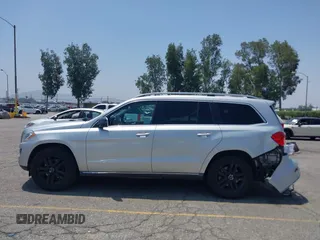 2014 Mercedes-Benz GL 450 z VIN 4JGDF7CE9EA411572, wystawiony jako IAAI lot #42461631 z przebiegiem 121 885 mil mil oraz . Historia ofert i sprzedaży dostępna na DreamBid. Obrazek 14.