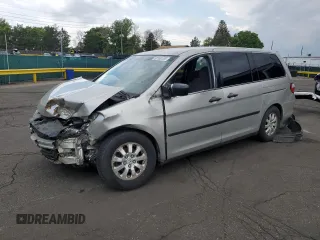 2005 Honda Odyssey LX with VIN 5FNRL38285B131076, listed as a Copart auction lot 60162285 with 215,396 mi miles and Salvage title. Bid and sale history available at DreamBid. Image 1.